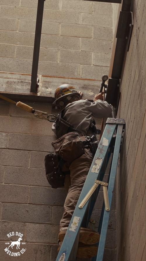 Frame from the Red Dog Welding stairwell film by Jake Mizell