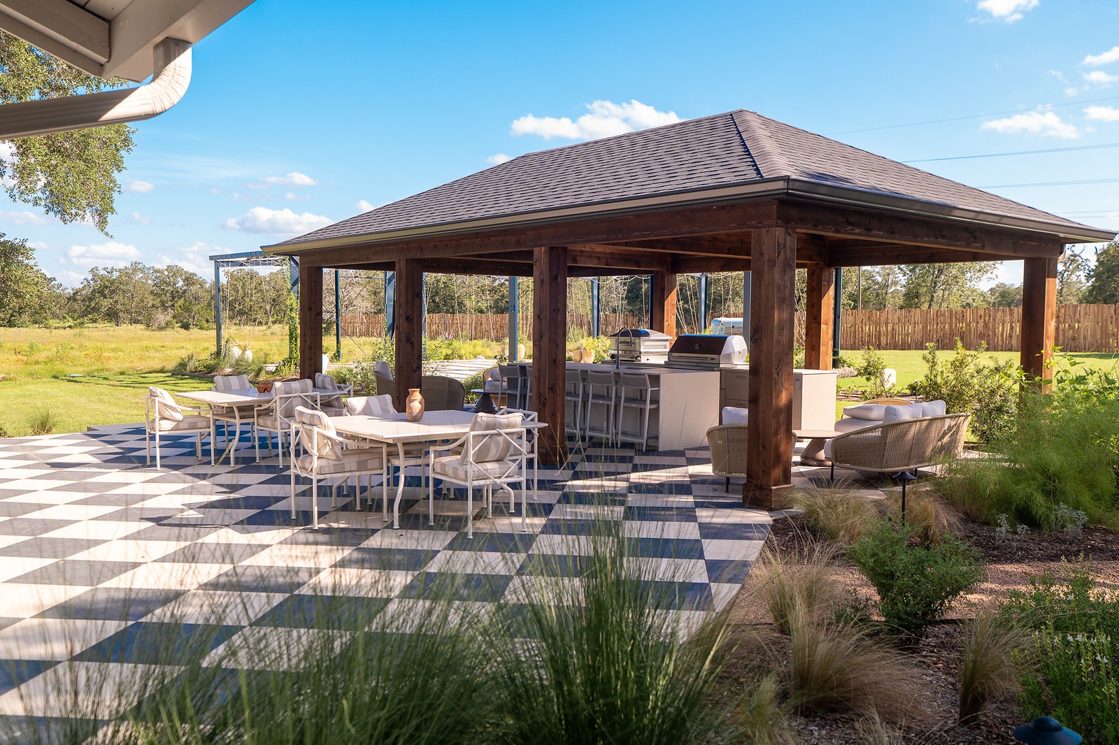 The poolside cabana and outdoor kitchen at Stardust Ranch, Texas, photographed by Jake Mizell